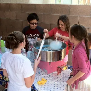 Kids using the cotton candy machine...BOOM a hit!