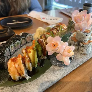 Tool box roll, spicy crunch tuna roll, and the yellowtail scallion roll