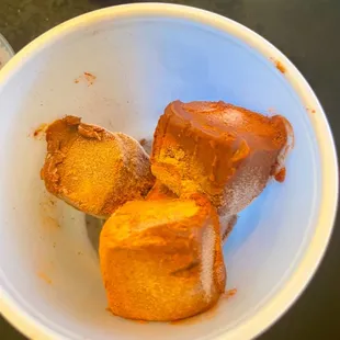 three pieces of cake in a bowl