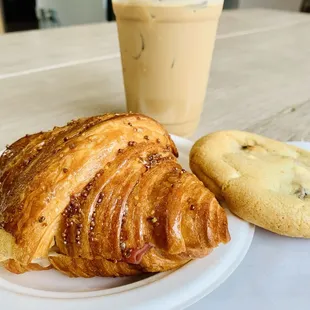ham &amp; cheese croissant, white chocolate cranberry cookie, es yen coffee
