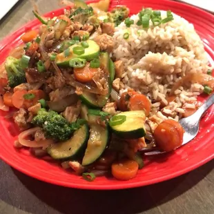 Stir-fry vegetable with chicken added and brown rice
