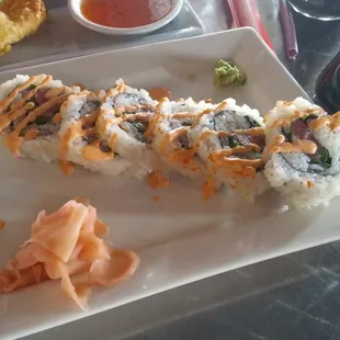 This particular roll is a favorite of mine and I think it's the dynamite roll? It has cilantro in it.