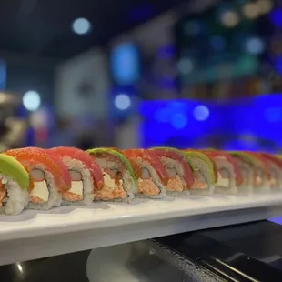 Butterfly Roll 
Ingredients: snowcrab mix, boiled shrimp, avocado, crabstick, cream cheese and Cajun tuna.