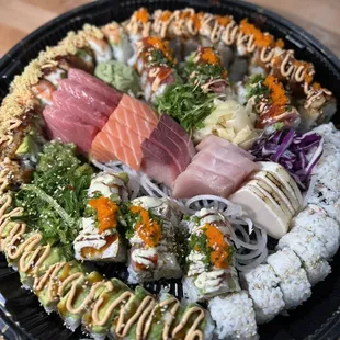 Takeout sushi platter sashimi and rolls