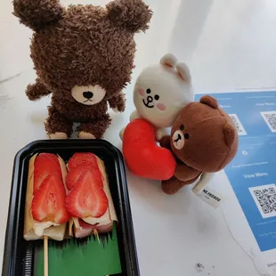 Strawberries, azuki beans, and sweet cream on mochi