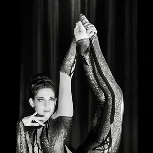 (Pictured) Coach Ariana. Come join our contortion and flexibility classes. Offered online and in person.