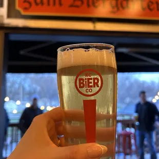 Beer + entrance to the Biergarten