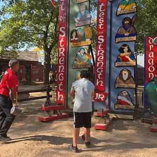 Test ur strength and try to ring the bell