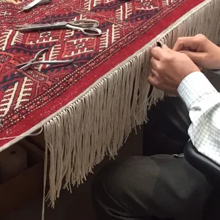 Repairing fringe on Bokhara rug