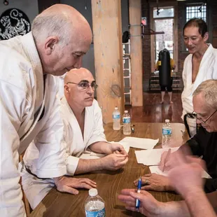 Senior members review grading results