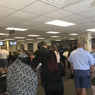 People standing and waiting.