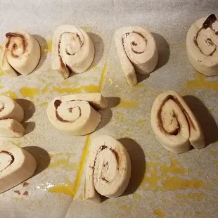 Frozen cinnamon roll loaf sliced into discs . Sit for ten hours till they really rise and puff up.