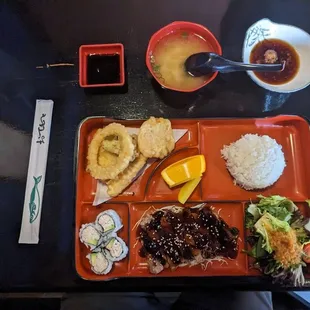 Beef teriyaki, miso, salad, California sushi pieces, rice, one shrimp and vegetable tempura, soy sauce (left), ginger dipping sauce (right)