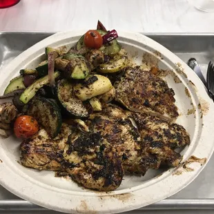 a plate of food on a tray
