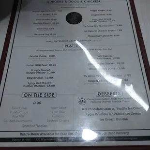 a menu for a restaurant on the side