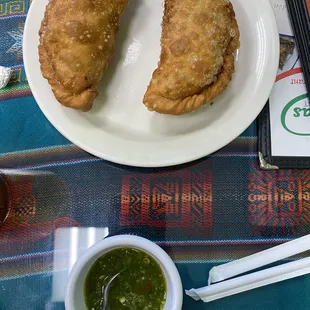 two empanadas on a plate