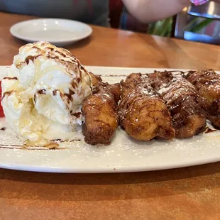 Fried Banana with Coconut Ice Cream ( honey drizzle on the ice cream )