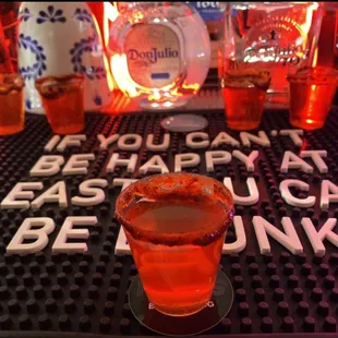 a shot of alcohol on a bar
