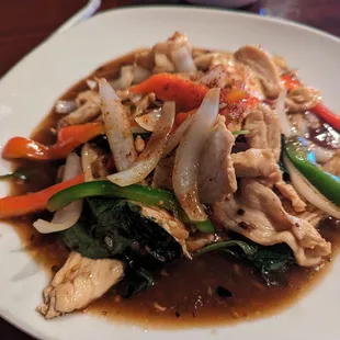 a plate of chicken and vegetables