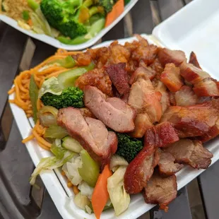 a plate of meat and vegetables