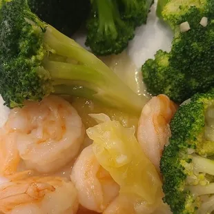 Shrimp with broccoli in a savory sauce with carrots and cabbage