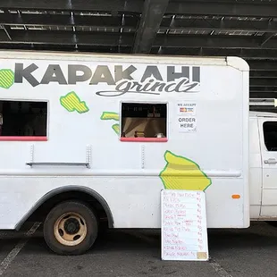 a food truck parked in a parking lot
