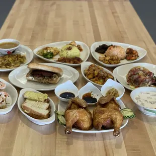 a variety of dishes of food on a table