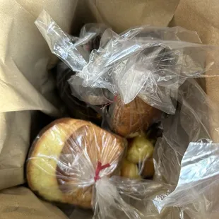 TooGoodToGo- 3 loaves of bread, one pack of mini-bread slider buns, mistake pretzel cookies and mistake chocolate