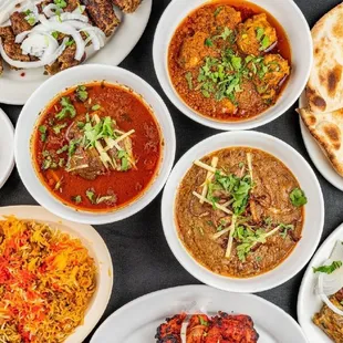 a variety of indian food dishes