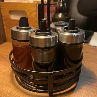 Various sauces in the table to enhance your meal.