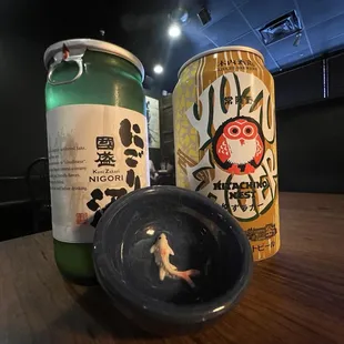 Unfiltered sake with cute fish sake cup, and a beer