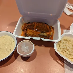 Moussaka with side of rice, tomato sauce and lemon rice soup