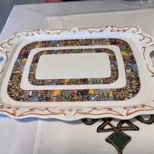 a platter with a decorative border