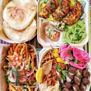 Chicken Entrée 2 sides: Cilantro Hummus &amp; Rice. Feta Fries. Falafel Salad. Comes with pita/dressing/sauces. Made with luv.