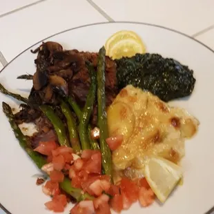 London Broil, Scalloped Potato, Creamed Spinach and Asparagus. Yum!