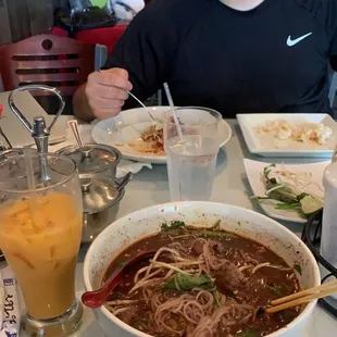 Beef pho soup and orange chicken