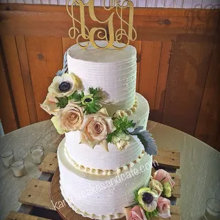 a three - tiered wedding cake
