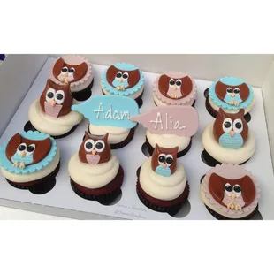 Cupcakes with owl fondant toppers for a baby shower