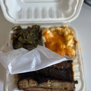 Jerk ribs and Mac n cheese and collard greens