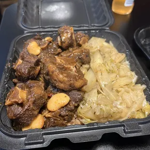 Oxtails and cabbage.