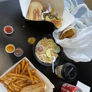 Free tea, Philly cheese steak sandwich with rice, and a Killama-gyro burger with fries. Couldn't forget about the Samosa's.
