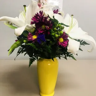Such a beautiful arrangement!! Was very satisfied with this purchase for my mom!