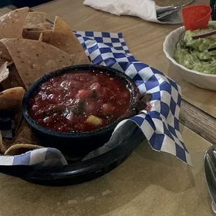 Chips and dip (salsa and a separate bowl of guacamole).