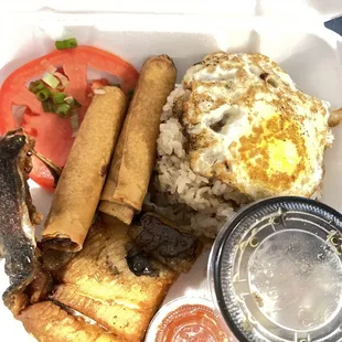 a styrofoam container filled with food