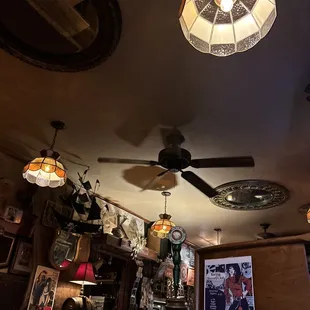 a ceiling fan and a clock