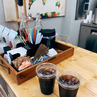 two cups of coffee on a counter