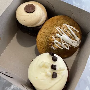 Double chocolate, peanut butter cup, oatmeal raisin cookie and chocolate chip cookie