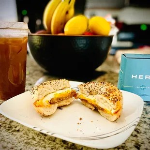Iced Omazing Chai Tea (extra shot, almond milk, no nutmeg), Everything Bagel w/sausage, egg &amp; cheese + a Hero Bianchi Candle