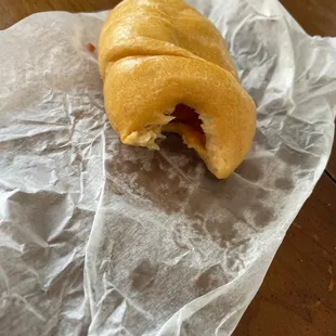 Sausage and Cheese Kolache (you can see the grease on the paper)