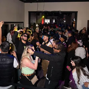 a large group of people at a party